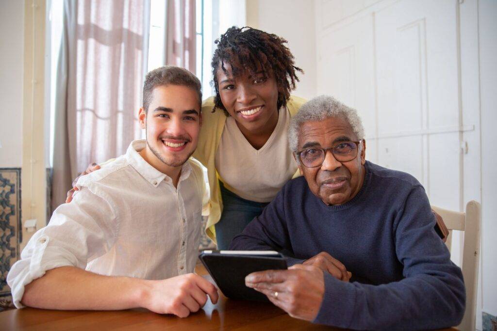Caregiver organising important care documents in a folder