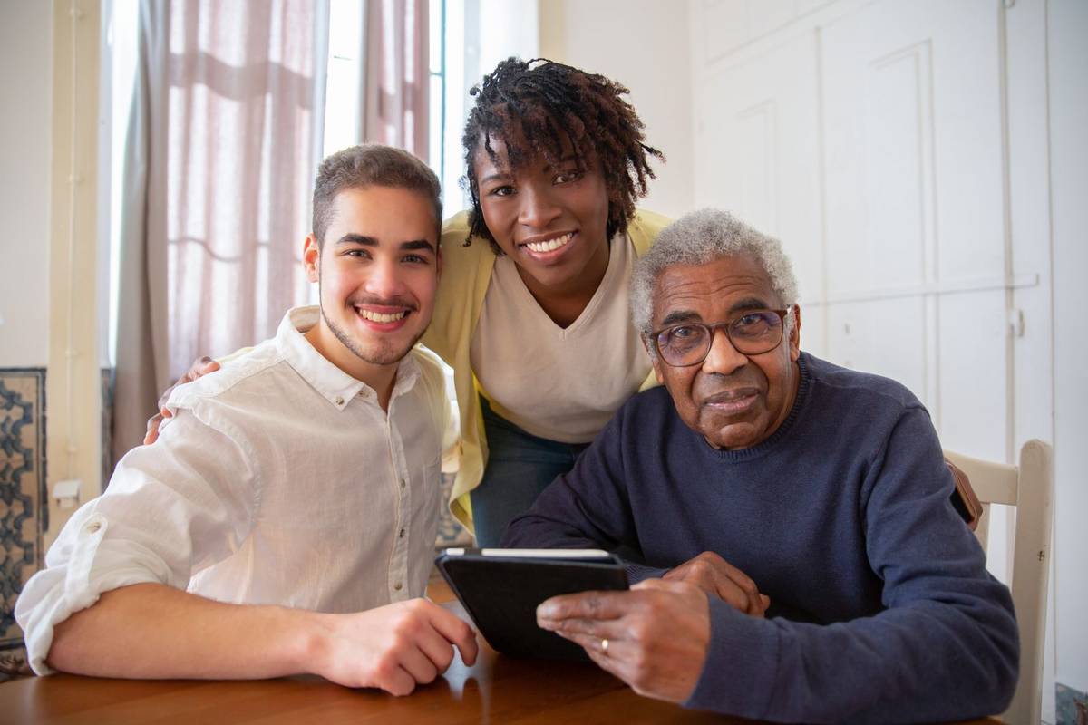 Caregiver organising important care documents in a folder