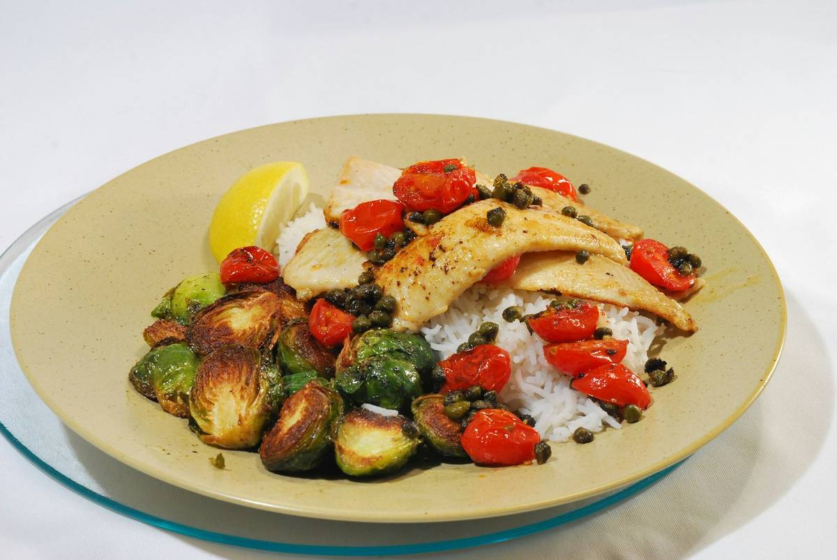 Balanced meal with fish, rice and vegetables