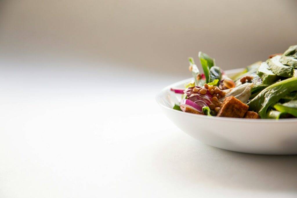 Fresh salad bowl ready to be served with a simple dressing