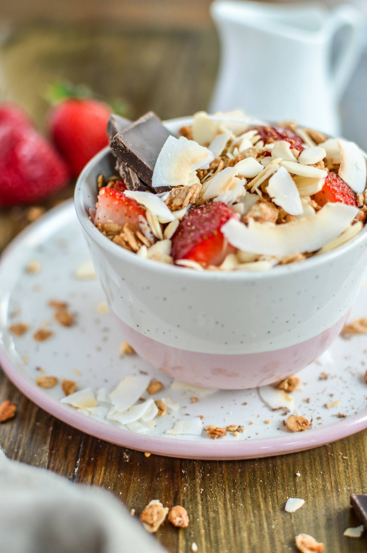 Homemade snack with fruit, yogurt, granola and nuts