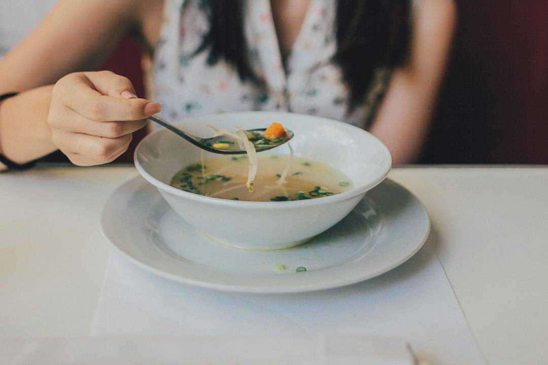 Bowl of vegetable soup served as a simple meal