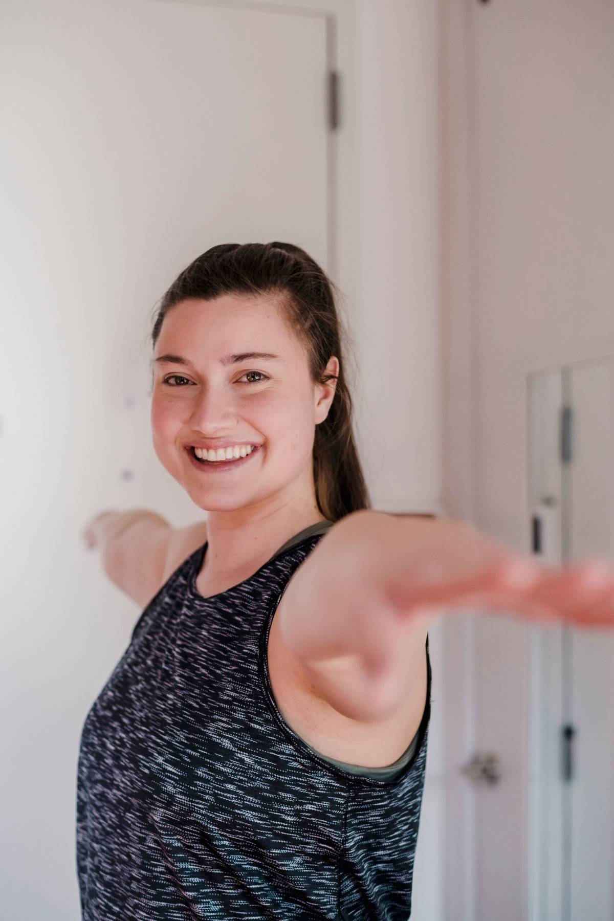 Woman exercising at home during a beginner workout