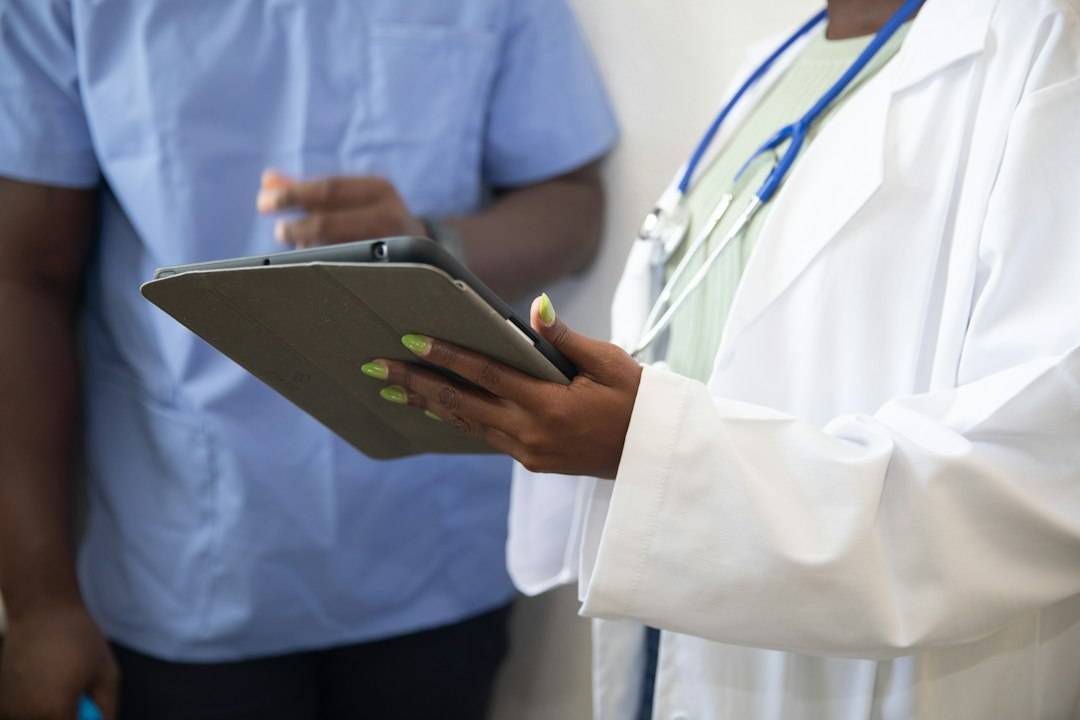 Doctor reviewing referral information with a patient