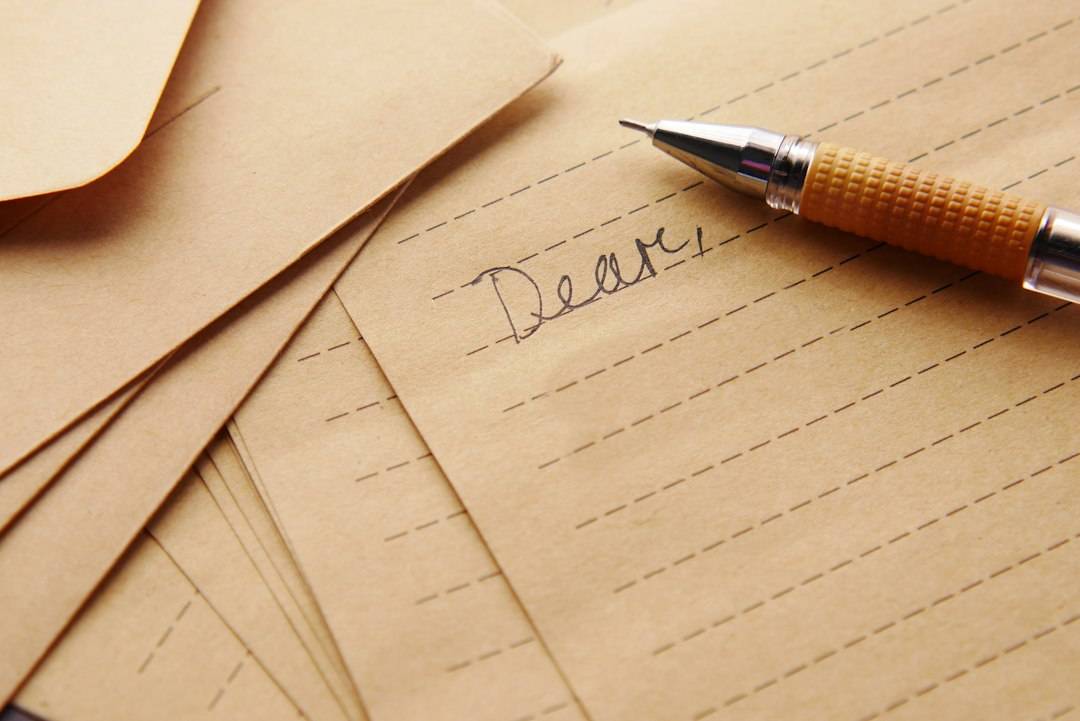 Pen and medical paperwork representing a referral letter and health records