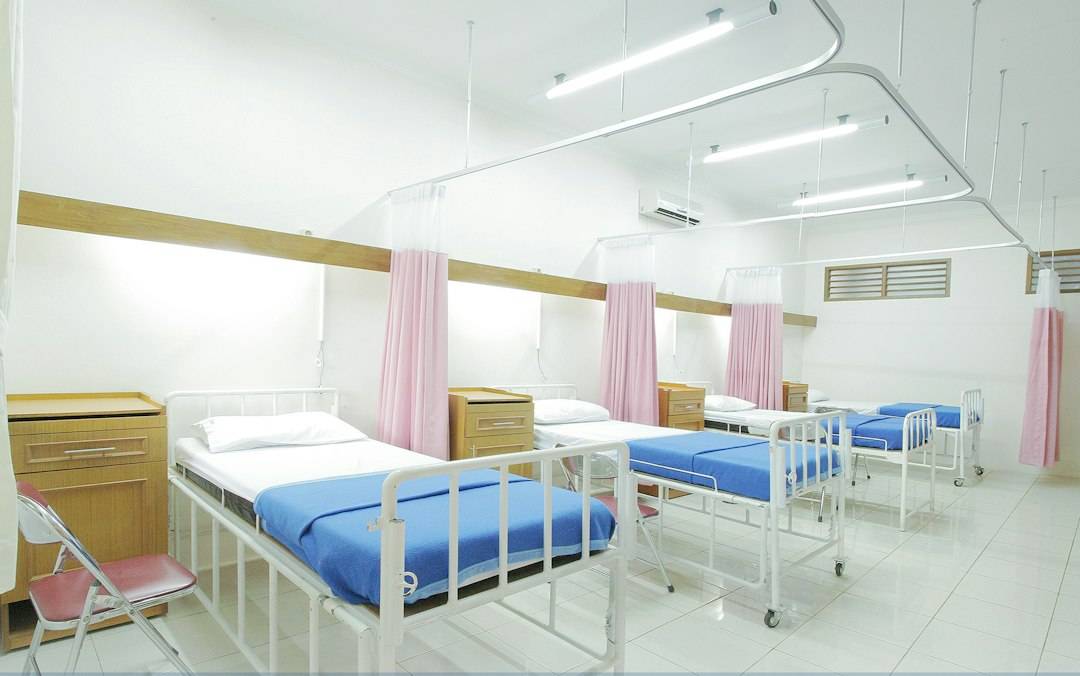 Hospital ward representing referral transfer between NHS providers