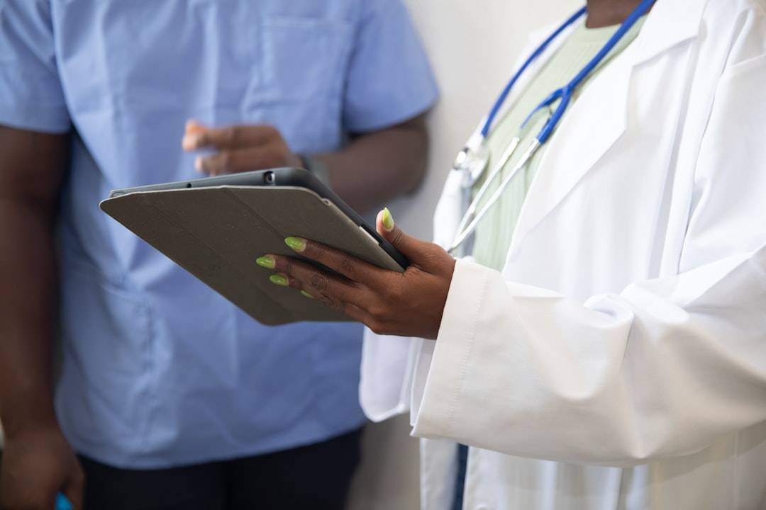 Doctor discussing hospital and treatment options with a patient