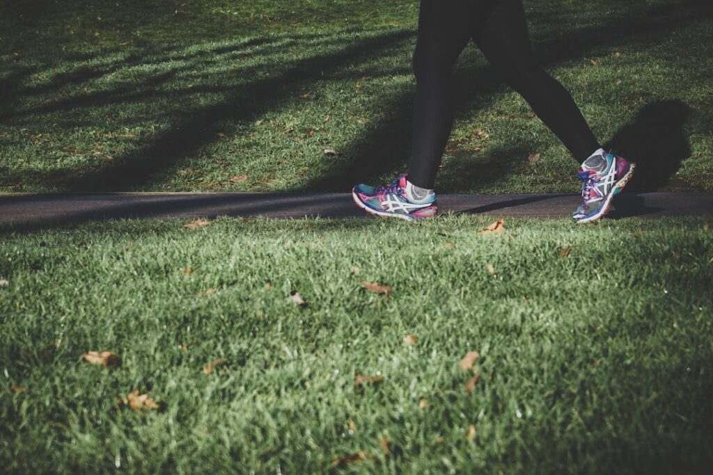 Adult exercising outdoors in a park in London