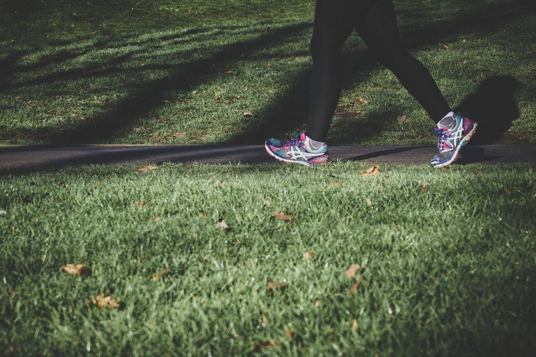 Adult exercising outdoors in a park in London